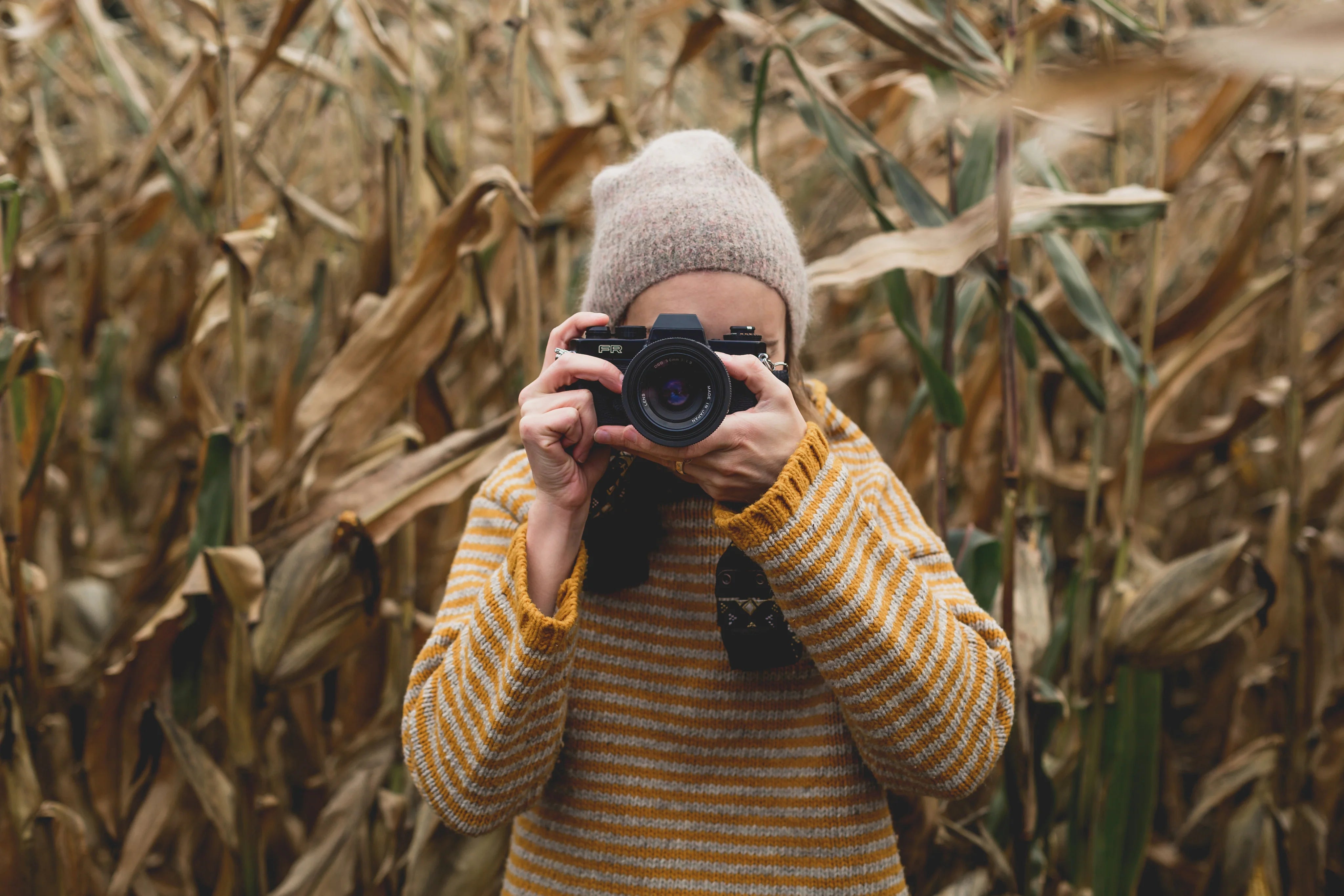 files/autumn-photographer-taking-picture.webp