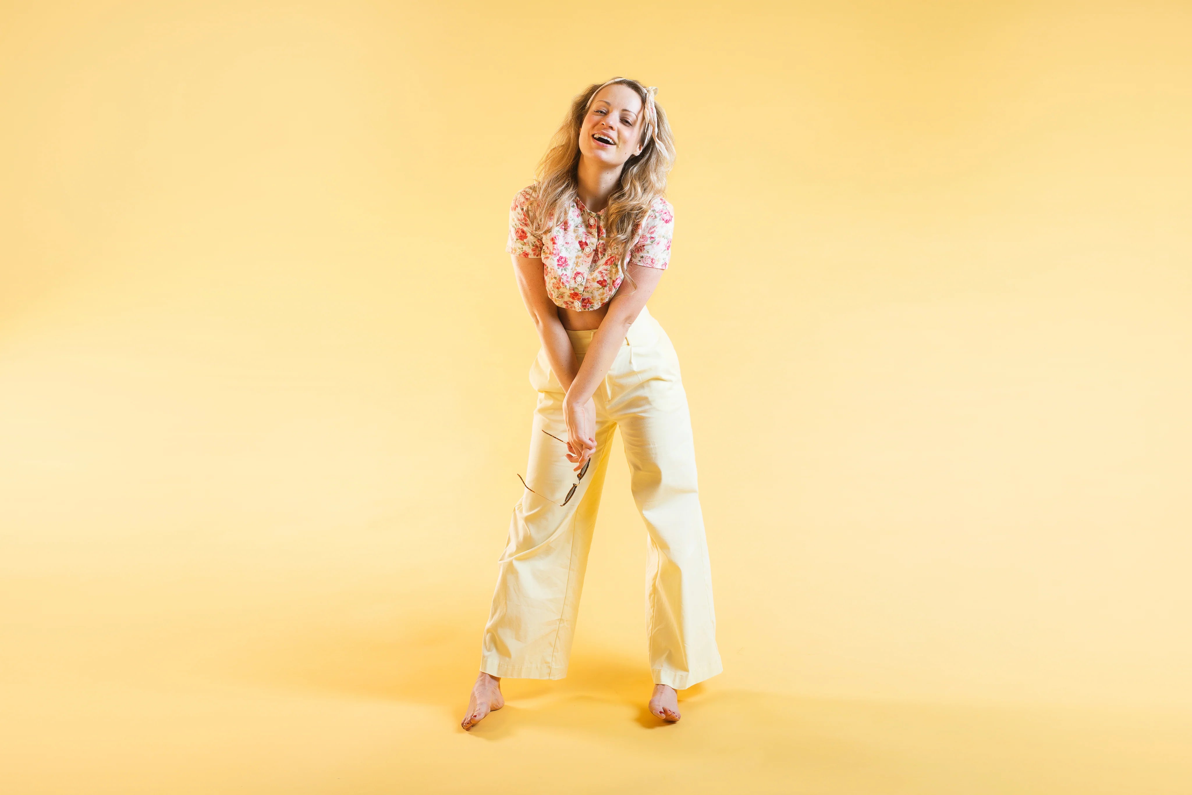 files/model-laughs-barefoot.webp