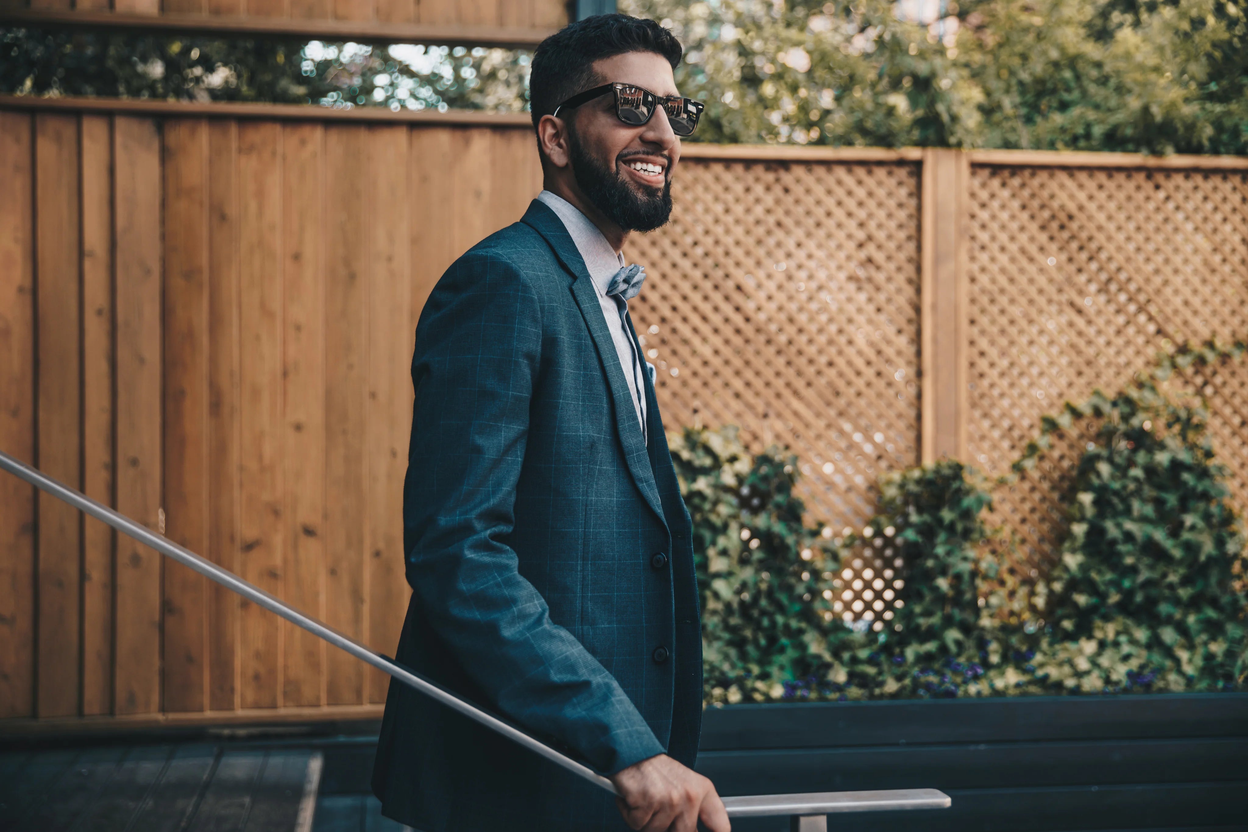 files/smiling-man-in-formalwear.webp